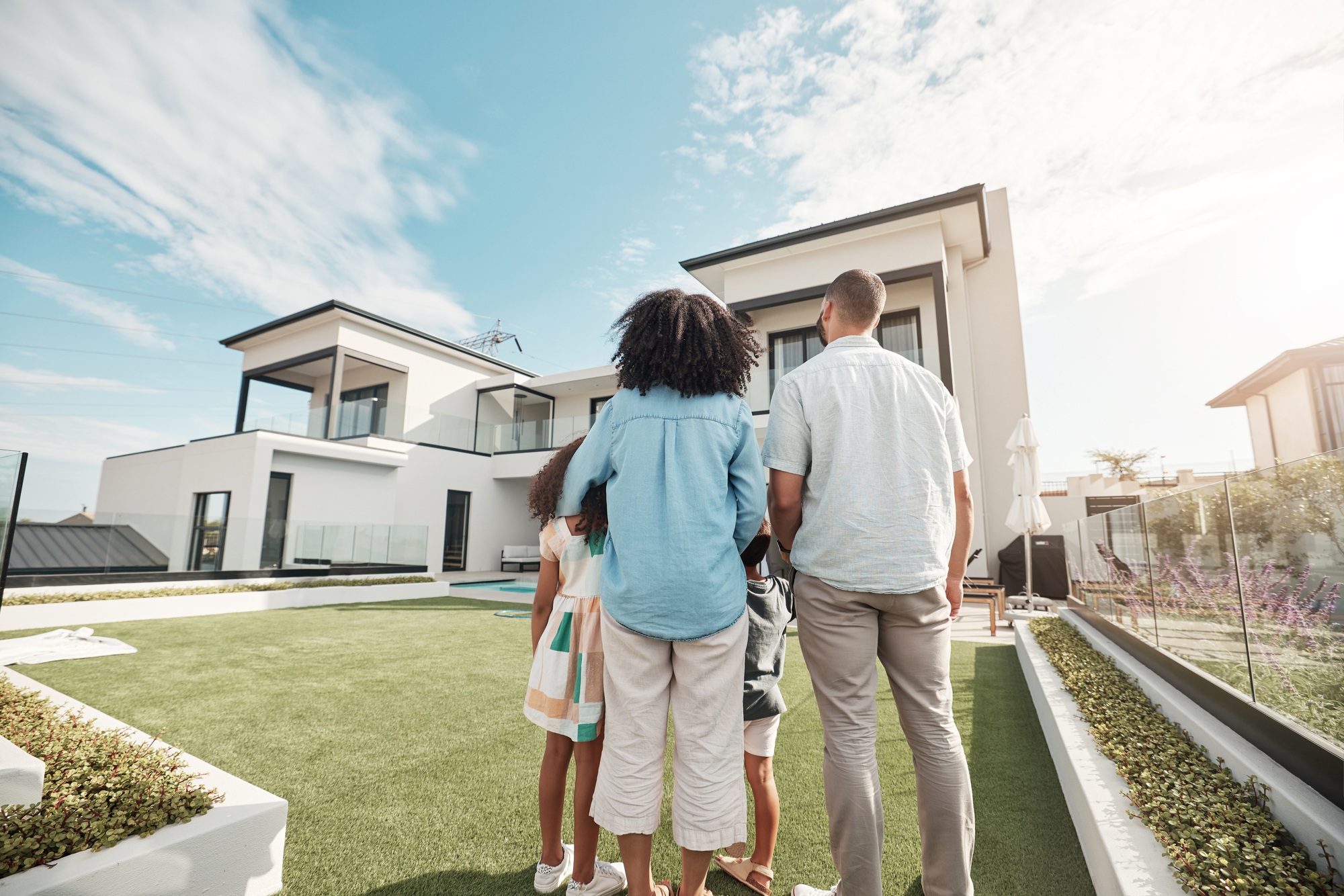 Love, new house and family in their backyard together looking at their property or luxury real esta